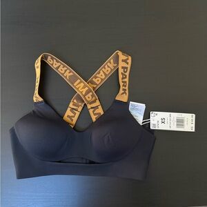 IVY PARK Black Sports Bra with Gold Straps